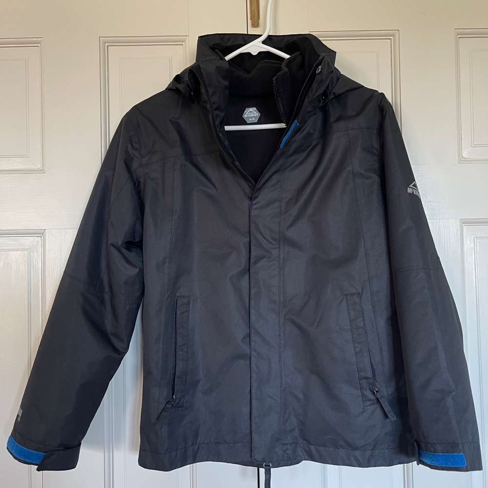 Black and Blue Raincoat with High Collar and Water-Resistant Fabric